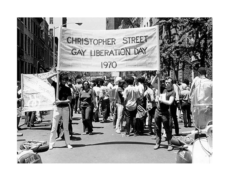 Men marching at The Christopher Street Liberation Day March.