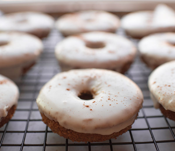 image of donuts on a cooling rack from the another angle.