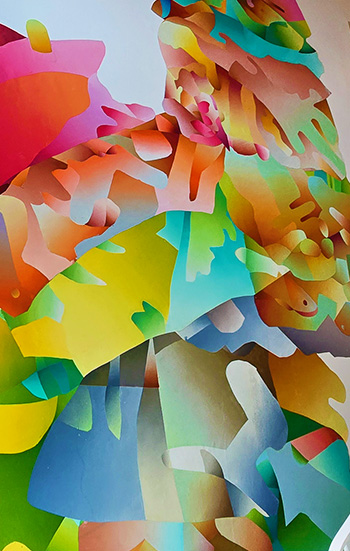 Abstract art with layered, colorful shapes in a fluid, organic composition.