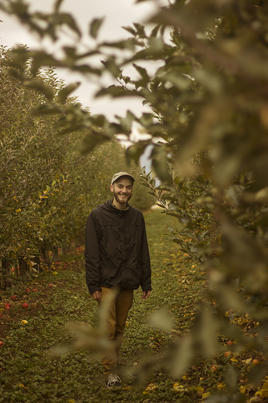 Ryan in a apple orchard.