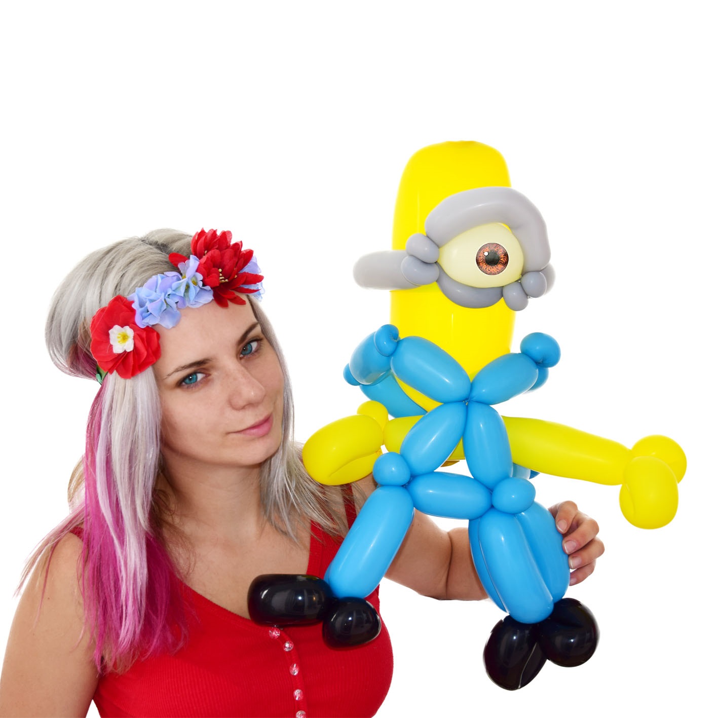 woman holding minion balloon