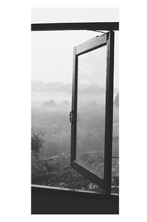black and white photo of open window