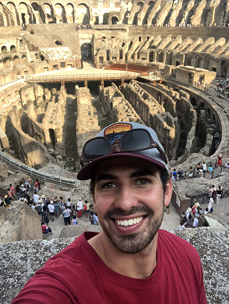 person at the Roman Coliseum