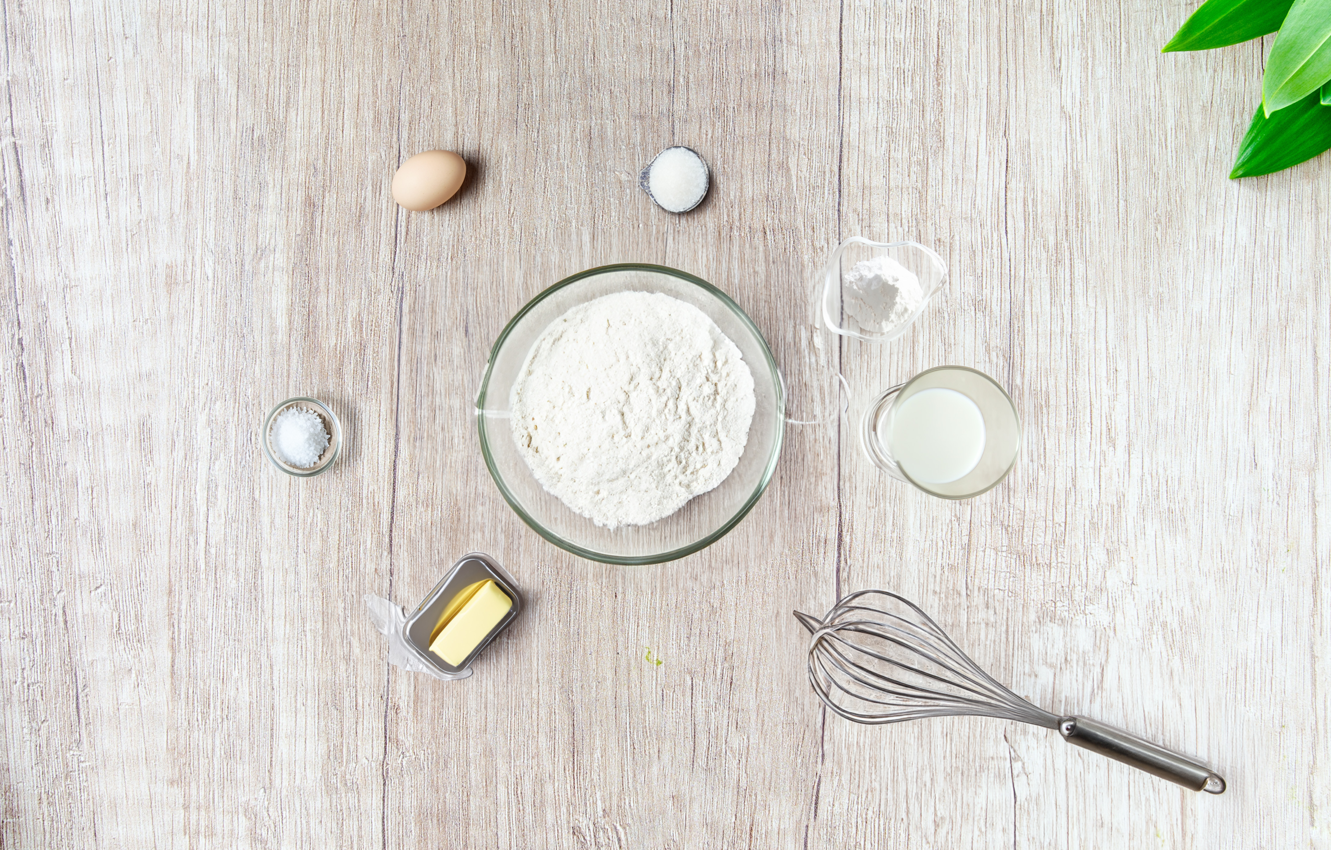 table with all dough ingredients laid out.