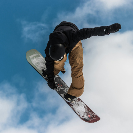 snowboarder carving snow