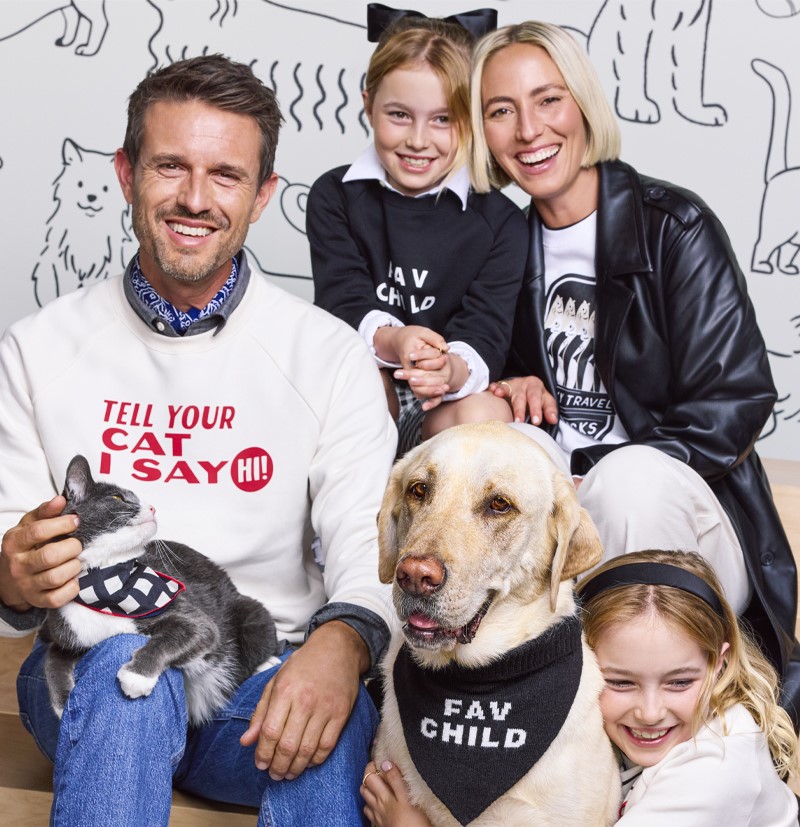 family photo with parents, kids, and pets