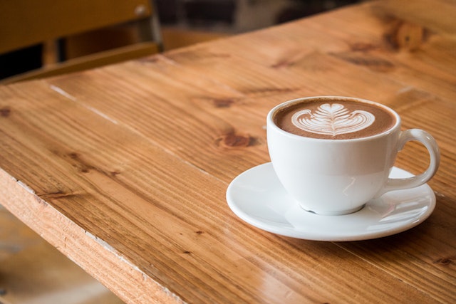 an image of cafe latte on a wooden table