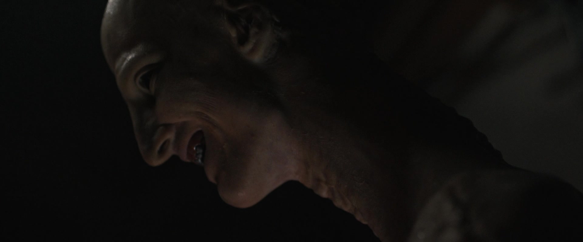 Profile view of 'The Offspring' smiling