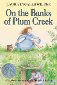 Revised cover art for On the Banks of Plum Creek.
