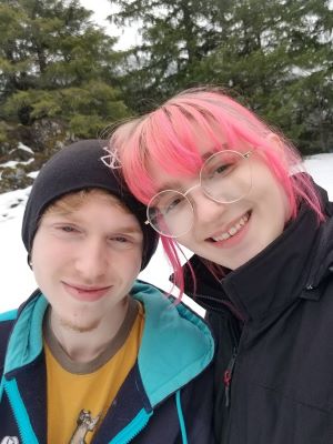 A photo of Kylie's partner and herself in the snow.