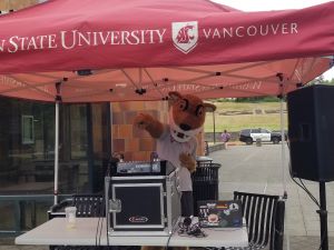 A photo of the WSU mascot DJ'ing.