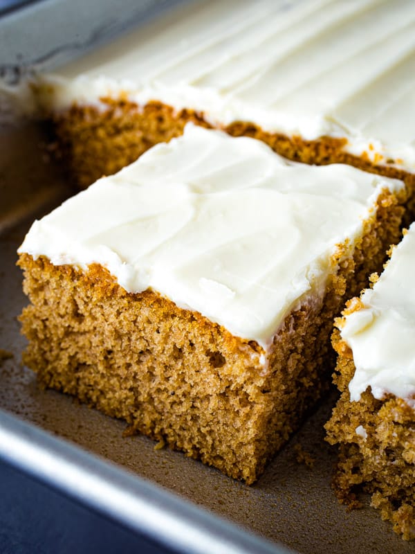 Full spice cake with a small slice