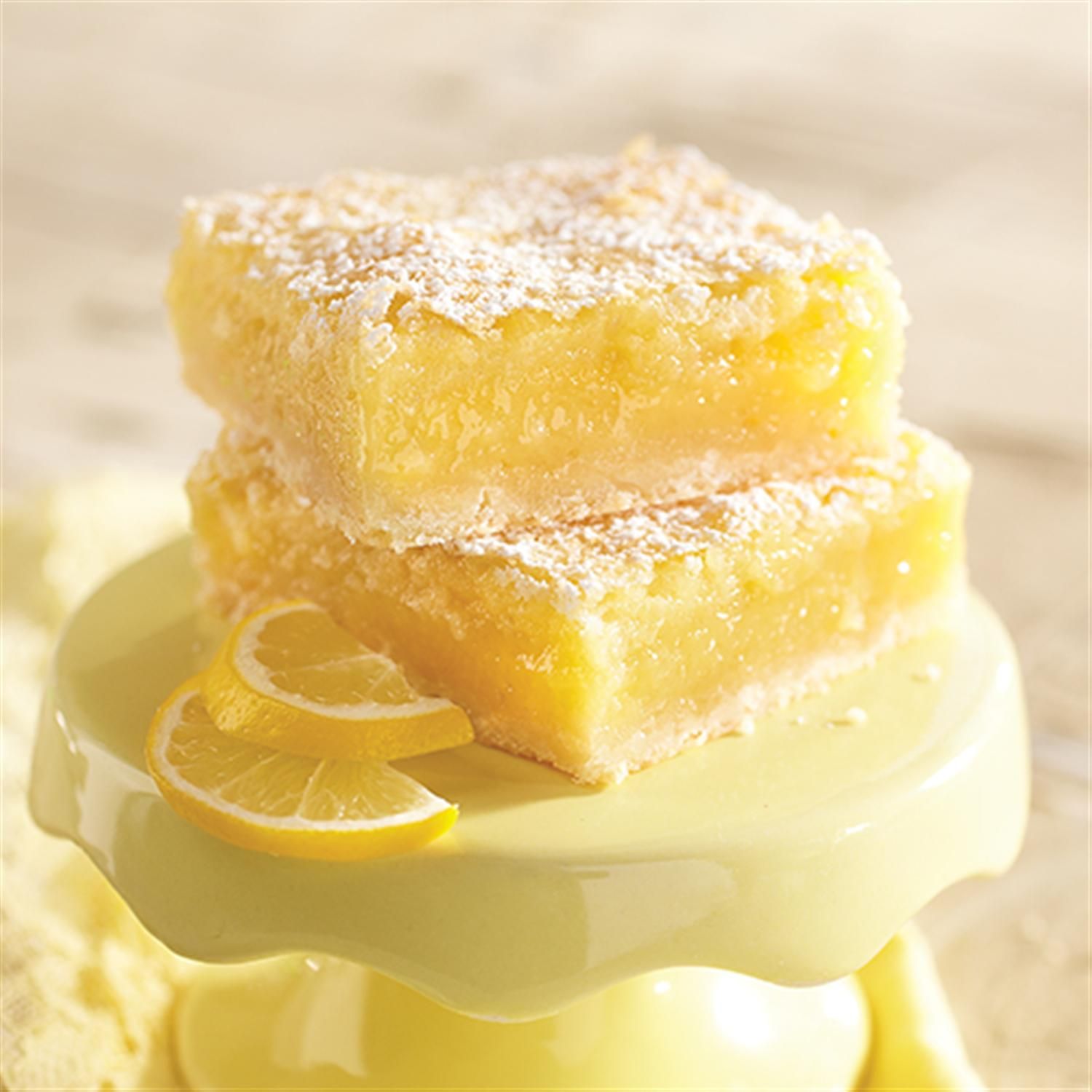 Lemon Bars Stacked on Dish