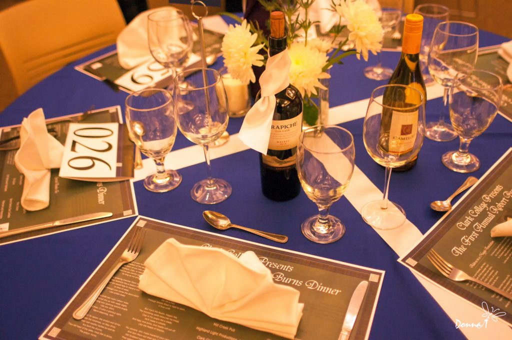 Table prepared for catering at the Robert Burns dinner.