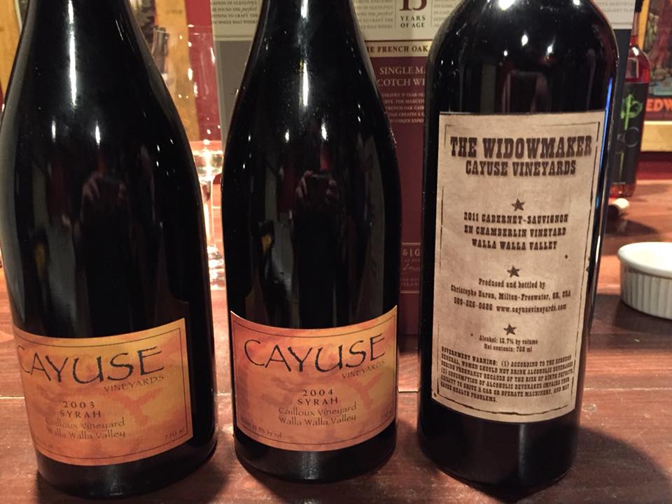 Two bottles of Syrah and a bottle of The Widowmaker wines from Cayuse Vinyards.