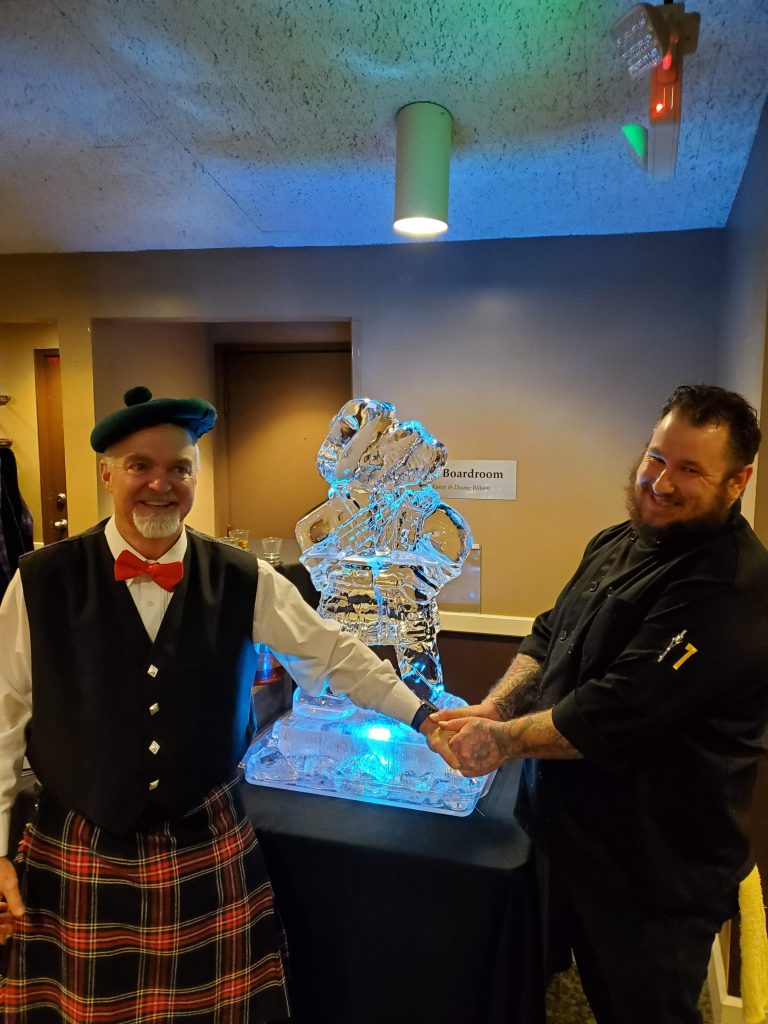 An ice sculpture of a Scottish piper at the event.