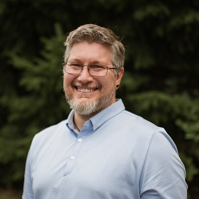 Portrait of Aaron Shannon, Web Development Team Lead for Phonic Bloom, specializing in website design and full stack development