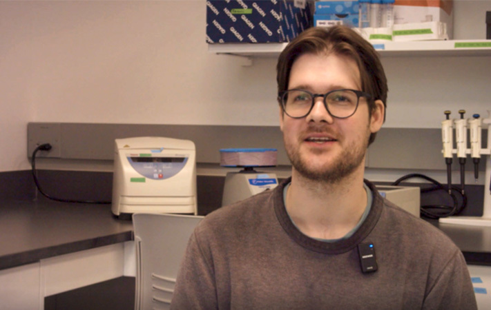 Interview headshot within a lab of Ryan Wagner, Laboratory Assistant & Biological Sciences PhD student.