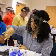A WSU Vancouver Scientist in a lab.