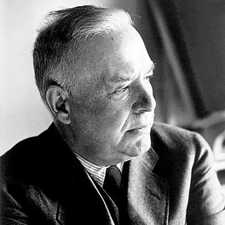 Wallace Stevens in black and white looking off to the side
