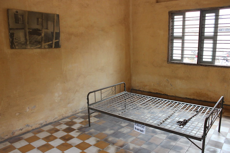 Inside S21, a metal bed where people were tortured.