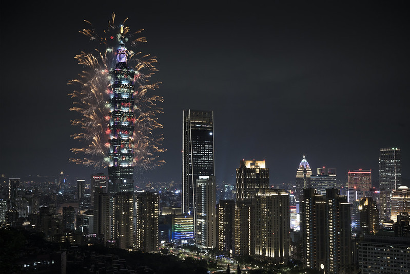 another view of fireworks being shot off of Taipei 101 at night